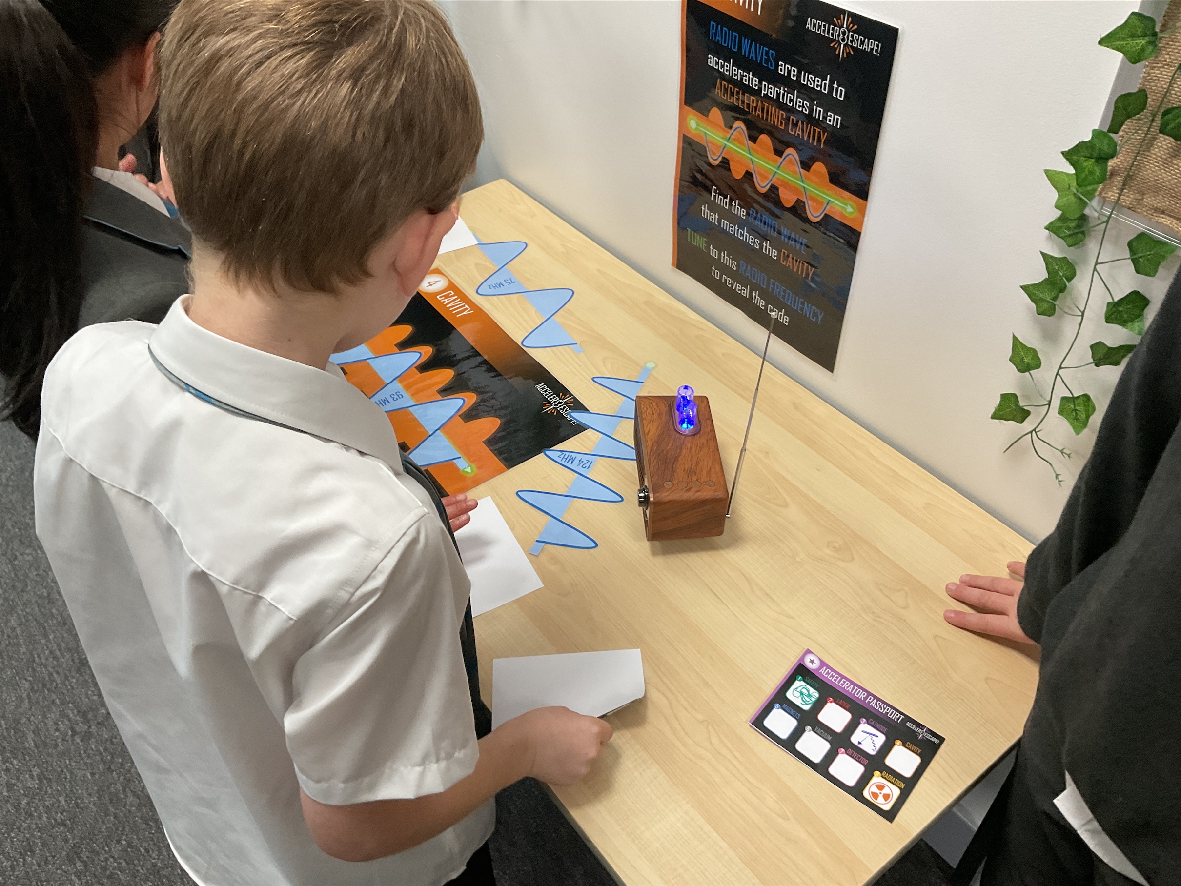 Kids playing in Acceler8 riddles